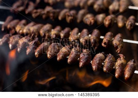 Churrasco, Traditional Brazilian Barbecue, Chicken Hearts Grilled Kebabs.