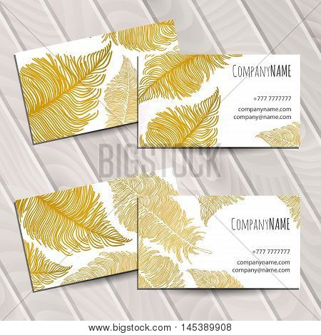 Business card with bright gol boho feathers