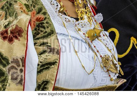 SELARGIUS, ITALY - September 13, 2015: Former marriage Selargino - Sardinia - detail of traditional Sardinian costumes of the folk group 