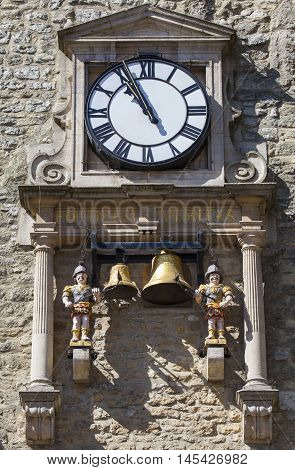 The clock and chiming quarter boys of St. Martins Tower popularly known as Carfax Tower in Oxford England.