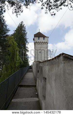 LUCERNE SWITZERLAND - MAY 04 2016: One of the nine survived towers of well-preserved ancient city walls is a part of Lucerne's ancient city walls called the Musegg