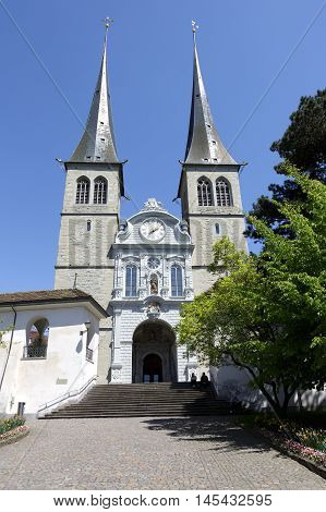 LUCERNE SWITZERLAND - MAY 06 2016: The front view of the Church of St. Leodegar that was built from 1633 to 1639. It is a recognizable landmark in the city
