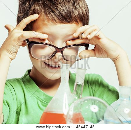 little cute boy with medicine glass isolated wearing glasses smiling real genious scientist