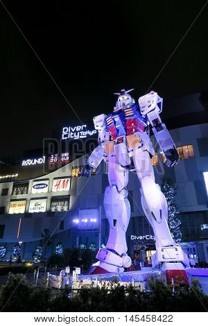 Tokyo, Japan - 19 August 2016. A Gundam statue stands in front of Diver City, Odaiba, Tokyo. It became one of most famous attraction among tourists.