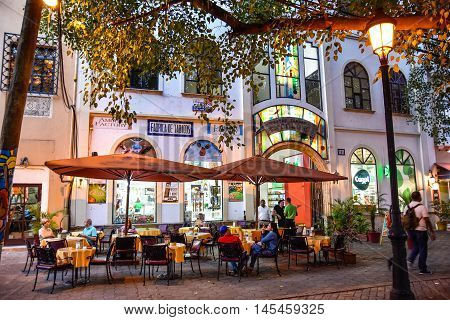 SANTO DOMINGO, DOMINICAN REPUBLIC - January 24, 2016: Bar near Commercial centre COLON and Fabrica de Tabacos in Columbus Park.