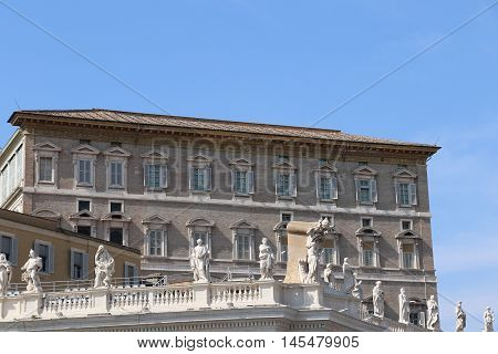 Building and statues of the Saint Peter Square in the Vatican