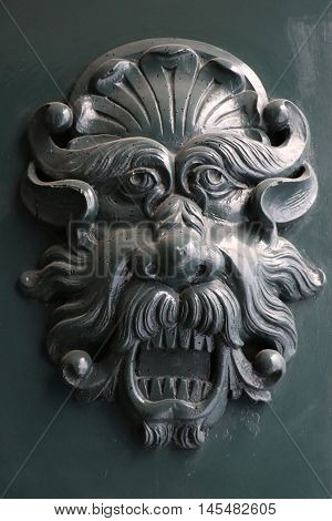 Detail of an ancient door in Rome