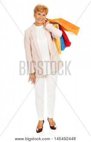 Happy business woman holging shopping bags