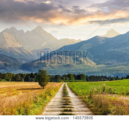 Rural Fields Near The High Mountains