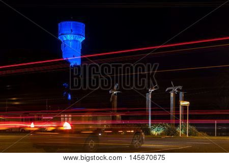 Foxton Icon the old water tower lights up with the color of blue. Also the Birds on post too.