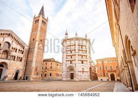 Parma cathedral with Baptistery leaning tower on the central square in Parma town in Italy