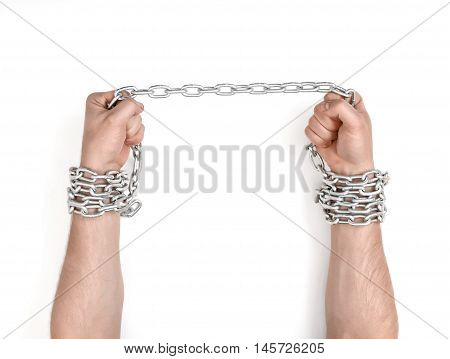 Close up view of chained man's hands. Fetter and captivity. Lack of freedom.