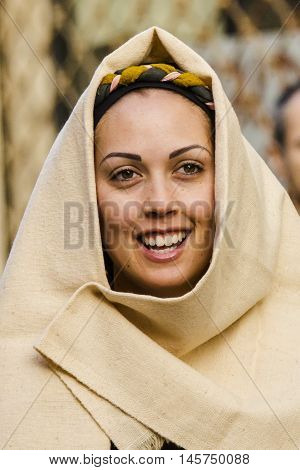 QUARTU S.E., ITALY: January 6, 2016: the procession of the Three Kings - Sardinia - portrait of a beautiful smiling girl in traditional costume