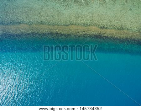 the surface of the water, turquoise in color with bird's eye