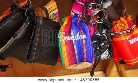Banos de Agua Santa, Tungurahua / Ecuador - September 2 2016: Indian handmade bag sale at a craft store in the Pasaje Artesanal in the downtown of the city of Banos