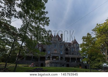 Boldt Castle surrounded by trees in the summer time
