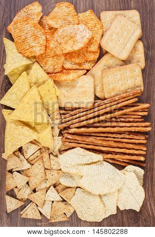 Heap Of Salted Crisps, Breadsticks And Cookies, Concept Of Unhealthy Food