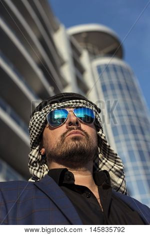 Oriental young businessman in the modern city