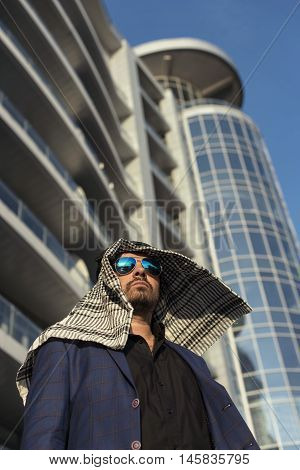 Oriental young businessman in the modern city
