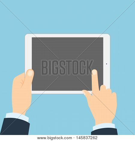 Hand touching tablet. White tablet with blank template screen. Finger touching screen.