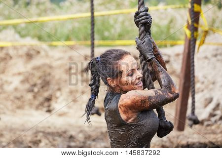 Extrim survival race concept.  Action woman