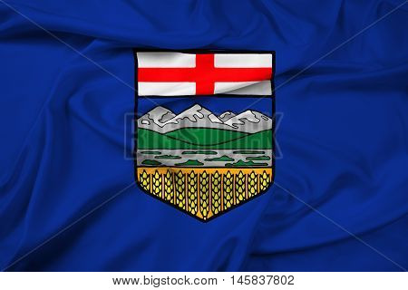 Waving Flag of Alberta Province Canada, with beautiful satin background.