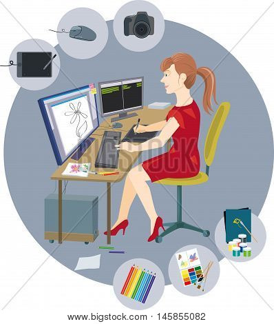 Designer girl sitting at the computer and drawing on a graphic tablet