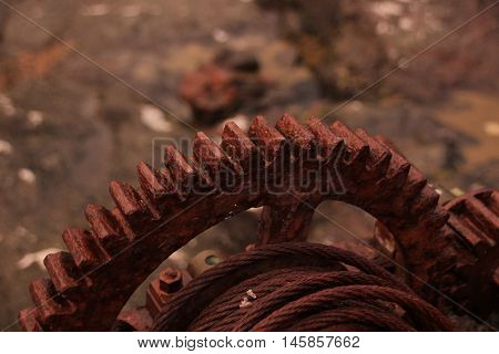 Rusted iron wheal at the coastline in the Faroe Islands