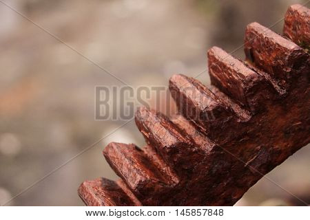 Rusted iron wheal at the coastline in the Faroe Islands
