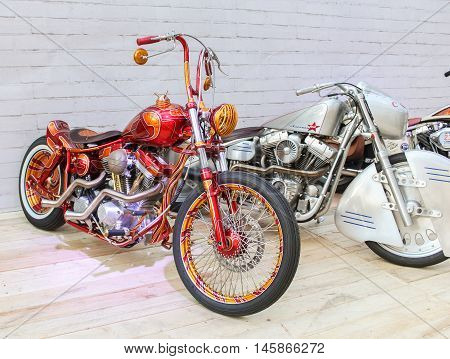 St. Petersburg, Russia - 12 August, Motorcycle in red and gold colors,12 August, 2016.
The annual International Festival of Motor Harley Davidson in St. Petersburg Ostrovsky Square.