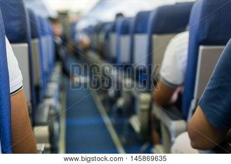Interior Of Airplane With Passengers On Seats Waiting To Taik Off.