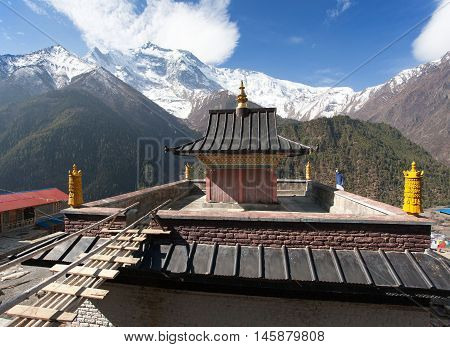 Upper Pisang view of gompa and Annapurna 2 II round Annapurna circuit trekking trail Nepal