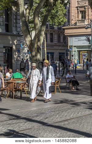 People Walk In The Town Of Marseilles
