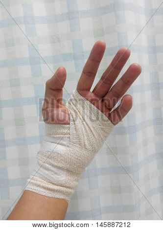 MALACCA, MALAYSIA -MARCH 09, 2016: Left wrist injury and wrap with bandage