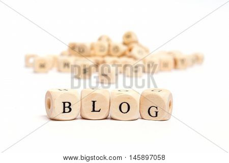 word with dice on white background - blog