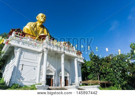 Giant image of Buddha at Wat Doi Ti Lam-Phun in Thailand