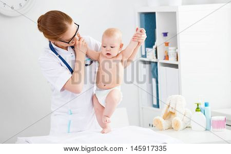 Doctor pediatrician and baby patient in clinic