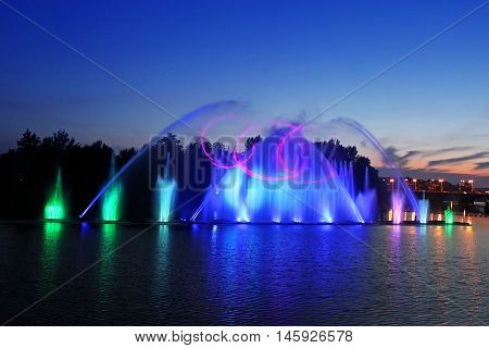VINNYTSIA, UKRAINE - JUNE 30, 2012: Biggest fountain on the river in Vinnytsia, Ukraine. Located in the river Southern Buh fountain has a length of 140 meters and the height of the jet up to 60 m