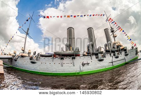 ST. PETERSBURG RUSSIA - JULY 29 2016: The legendary revolutionary cruiser Aurora at the place of eternal parking on the Petrograd embankment