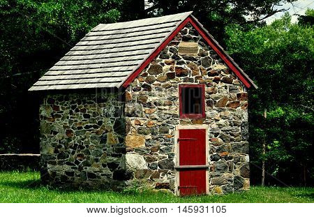 Chadds Ford Pennsylvania - June 9 2015: Stone utility farm building at the 18th century Gideon Gilpin House in Battle of Brandywine National Historic Park