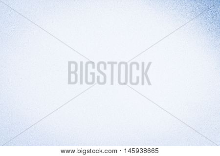 Full frame pale blue mottled background in horizontal 3:2 format.