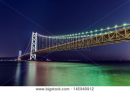 Lights on Akashi Ohashi Bridge in Kobe, Japan - the longest suspension bridge in the world.
