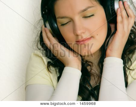 Young beautiful Girl listening Musik