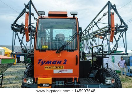 Tyumen, Russia - June 24, 2016: The 5th open championship of Russia on plowed land. Sprayer spreader self-propelled Tuman-2 for entering of fertilizer in liquid and granulated form