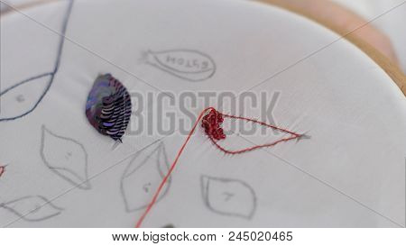 Fingers Embroideres A Picture. Close Up. Professional Shot In 4k