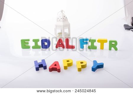 The Word Eid El Fitr  Written With Colorful Letters