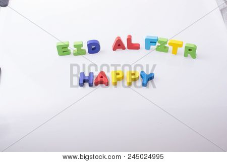 The Word Eid El Fitr  Written With Colorful Letters