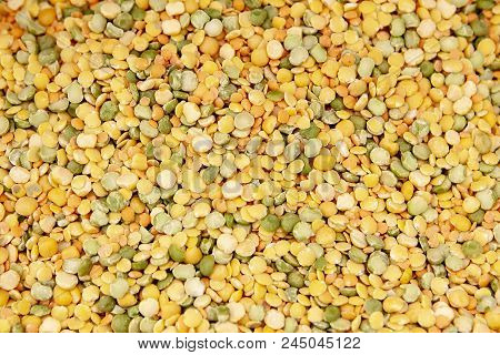 Dried Yellow Green Peas Laid Out Evenly. Photo With A Shallow Depth Of Field.