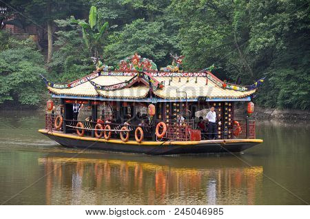 Mount Qingcheng, Sichuan, China - Jun. 21, 2012: Antique Tourism Boat On Yuecheng Lake In Mount Qing