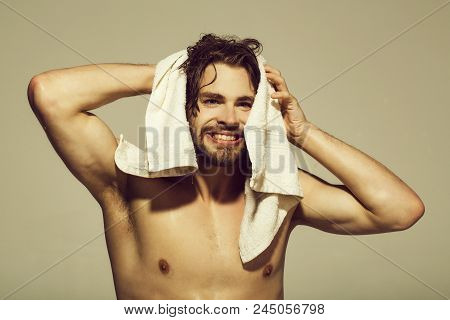 Hygiene And Skincare. Hygiene And Morning, Naked Smiling Man With Muscular Wet Body Hold Towel In Ba